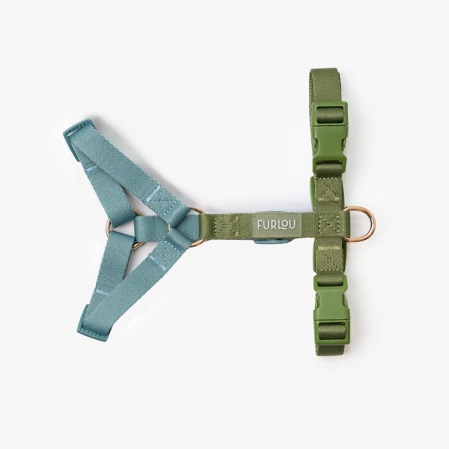 Green dog harness with visible brand name on a white background