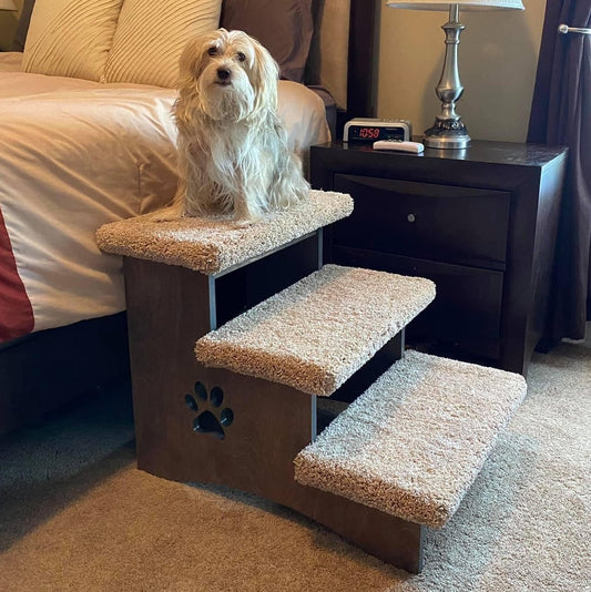 Pet steps with three wide, carpeted steps, ideal for helping pets reach higher surfaces, pictured against a neutral background.