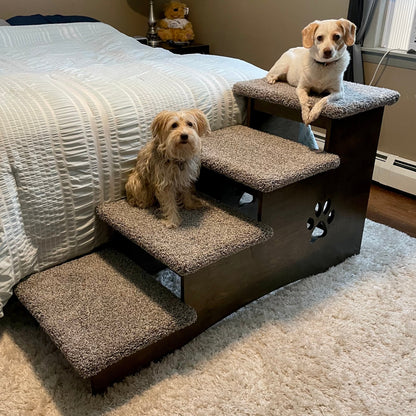 Image featuring two dogs sitting comfortably on the steps of our extra deep 23-inch pet steps in ebony stain with apollo blue carpeting, highlighting the product's size, color, and carpet option against a neutral background.